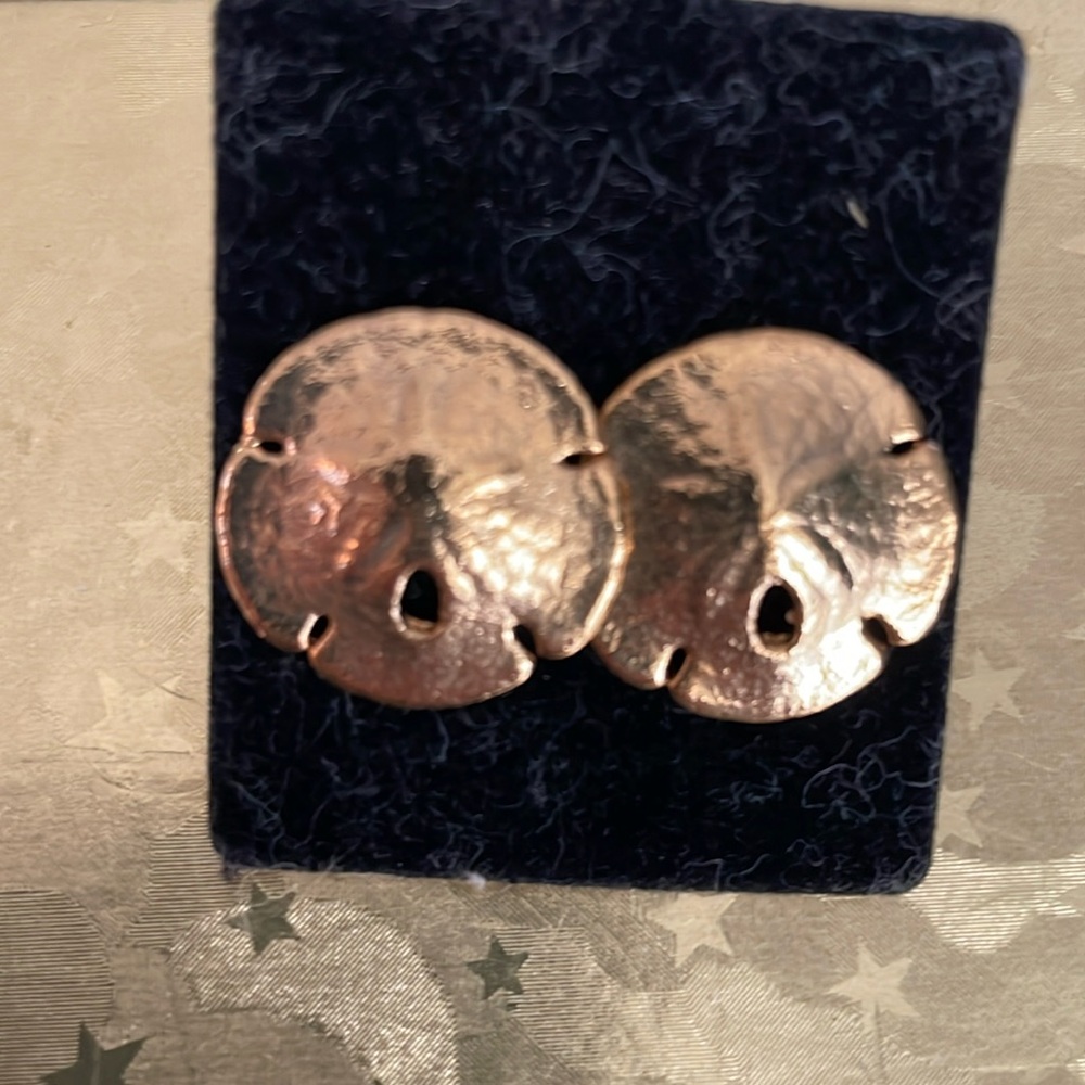 Gold dipped sand dollar earrings.  Post backings.